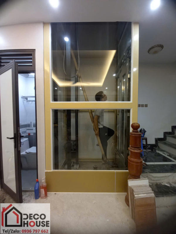 Kính cường lực ốp thang máy màu xám