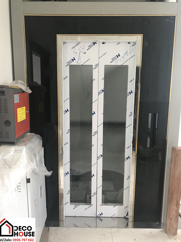 Ốp kính thang máy gia đình