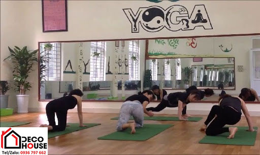 Thi công gương dán tường phòng tập yoga
